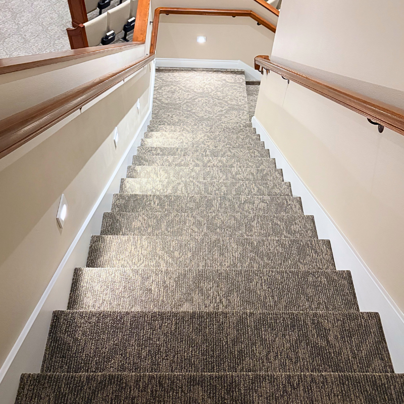Patterned commercial carpet on a church stairway.