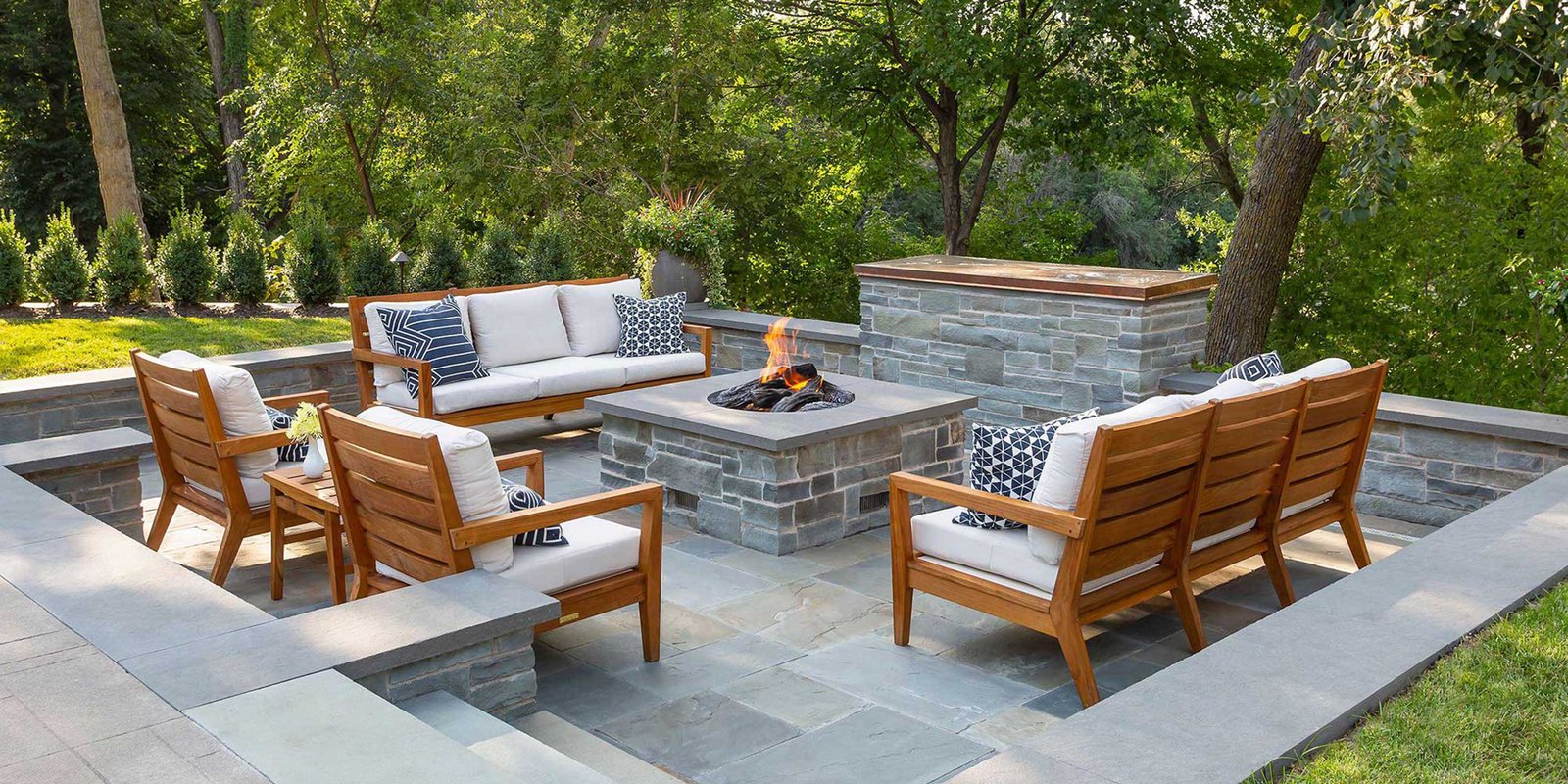 pretty outdoor space with fireplace and tile
