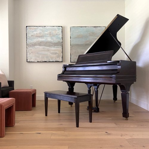 Piano room with engineered hardwood floors